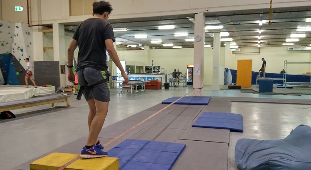 walking the slackline at Crank Indoor Climbing