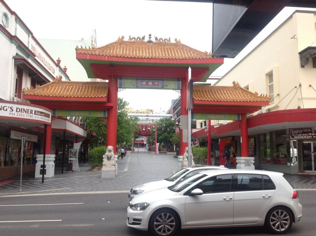 Entrance to chinatown in fortitude valley. traditional chinese roofs on pillars. 