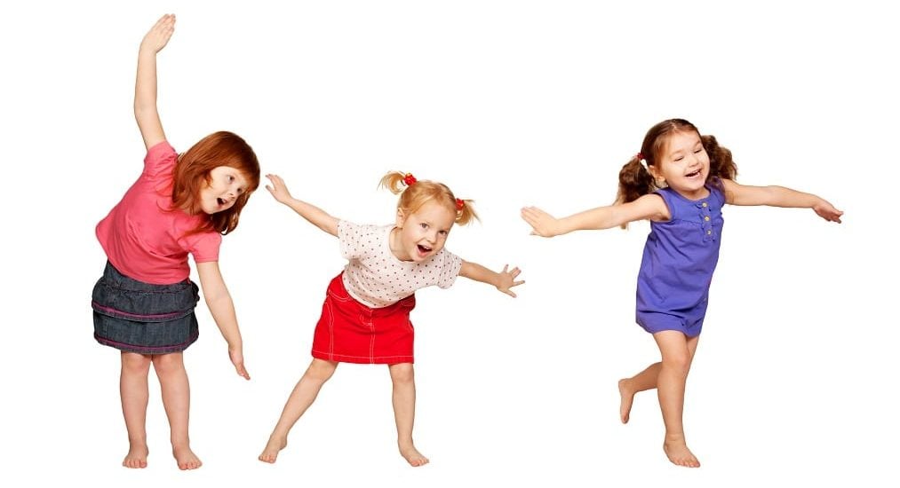 Three toddlers dancing