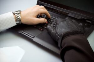 identity theft normal persons hand and hackers hand
