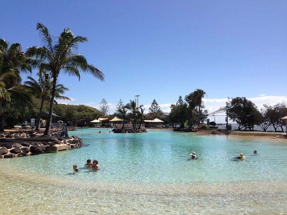 Settlement Cove in Redcliffe pople swimming on a beautiful day