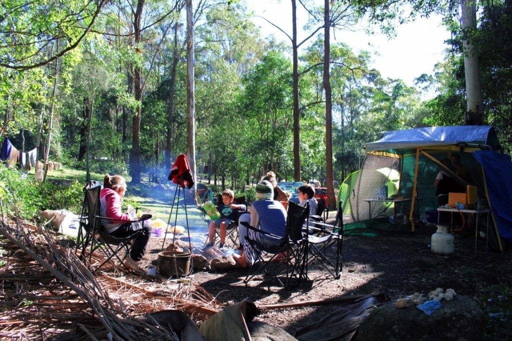 Thunderbird Park campers in front of fire - family attractions