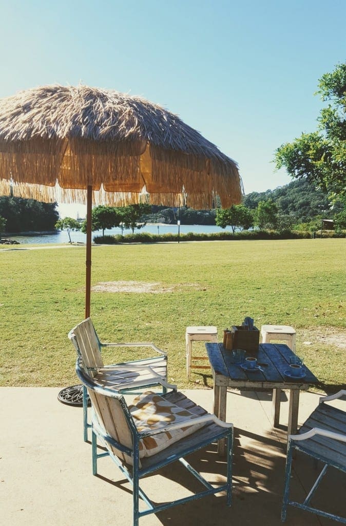 palm beach parklands dune cafe outdoor seating area with water views at palm beach parklands