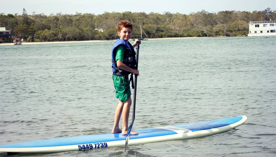 25 Things to do in Noosa with Kids in 2024, Paddle boarding
