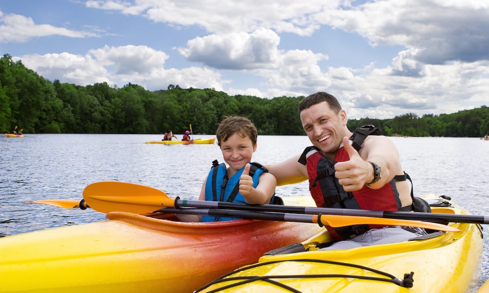 Family Friendly Camping Murwillumbah Father and son enjoying kayaking