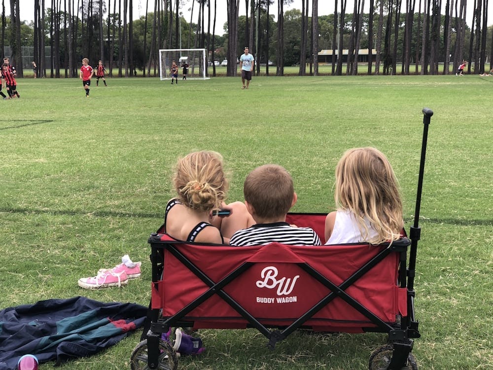 Young kids sitting in Buddy Wagon