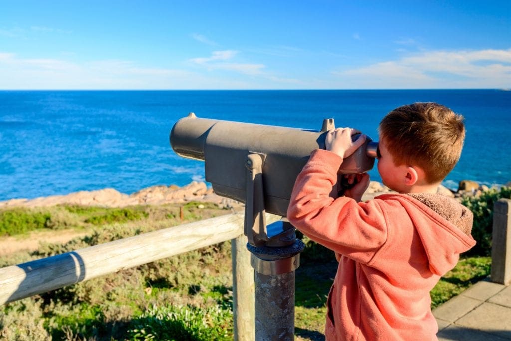 Boy Looking Through Telescope