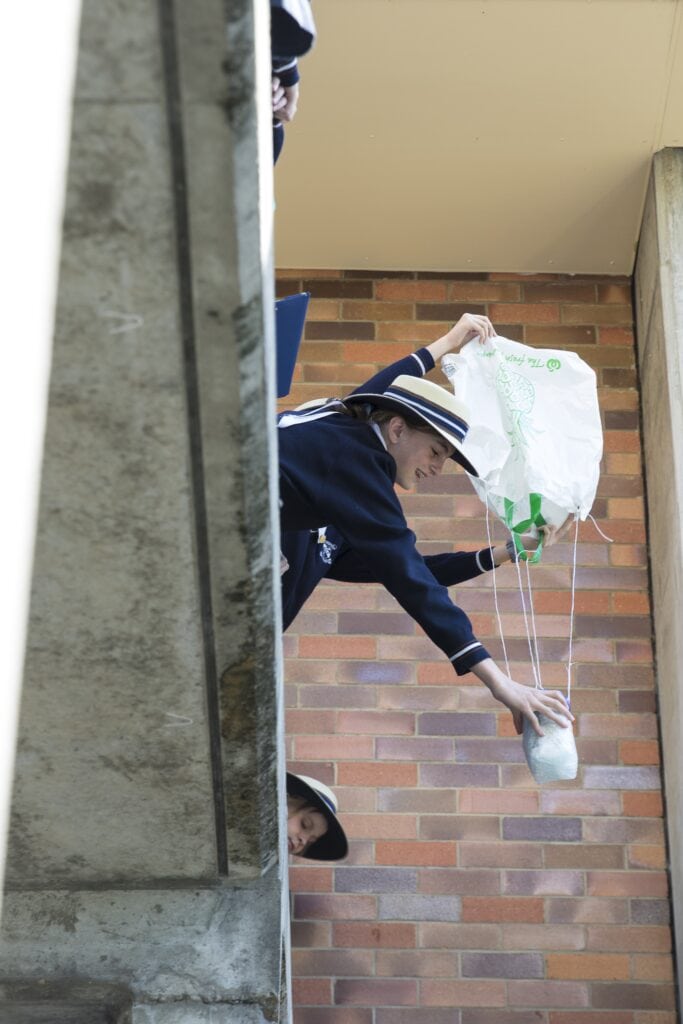 A St Margaret's Year 7 student about to test her egg drop contraption