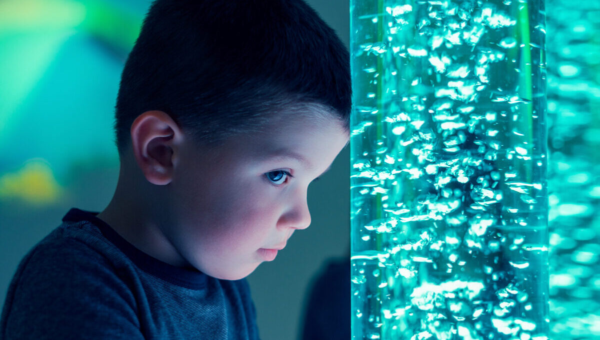 Child with Sensory Bubble Tube