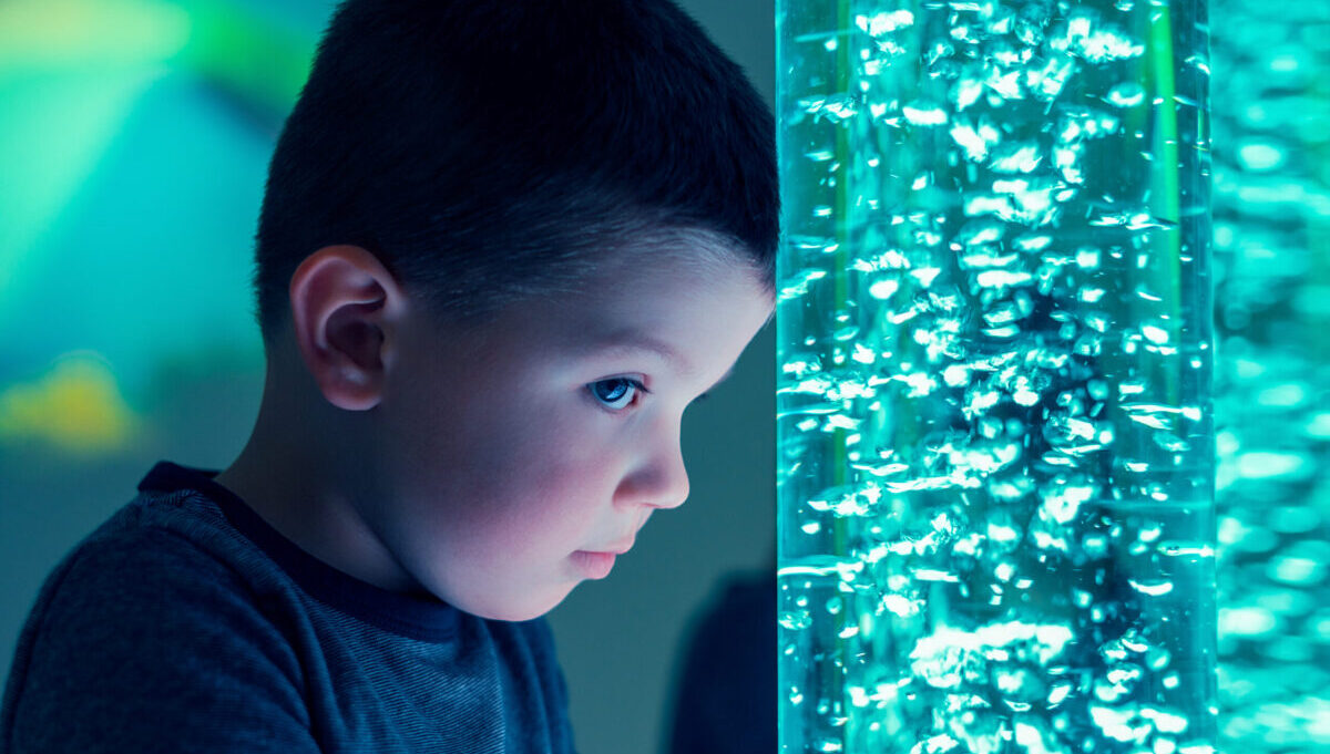 Child with Sensory Bubble Tube