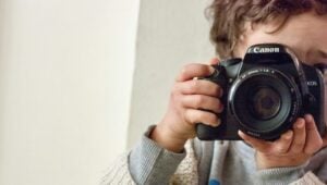 child with camera