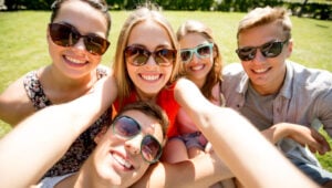 Teenagers take a selfie at Schoolies