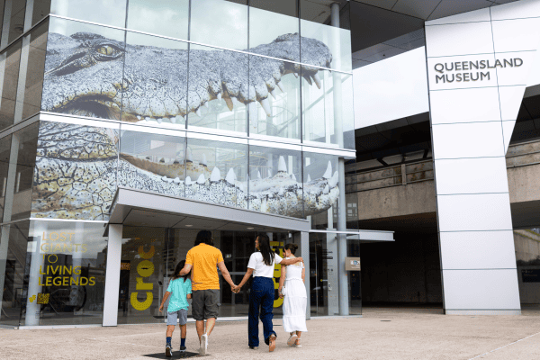 Sparklab Family walking into Queensland Museum to see the Croc! exhibition
