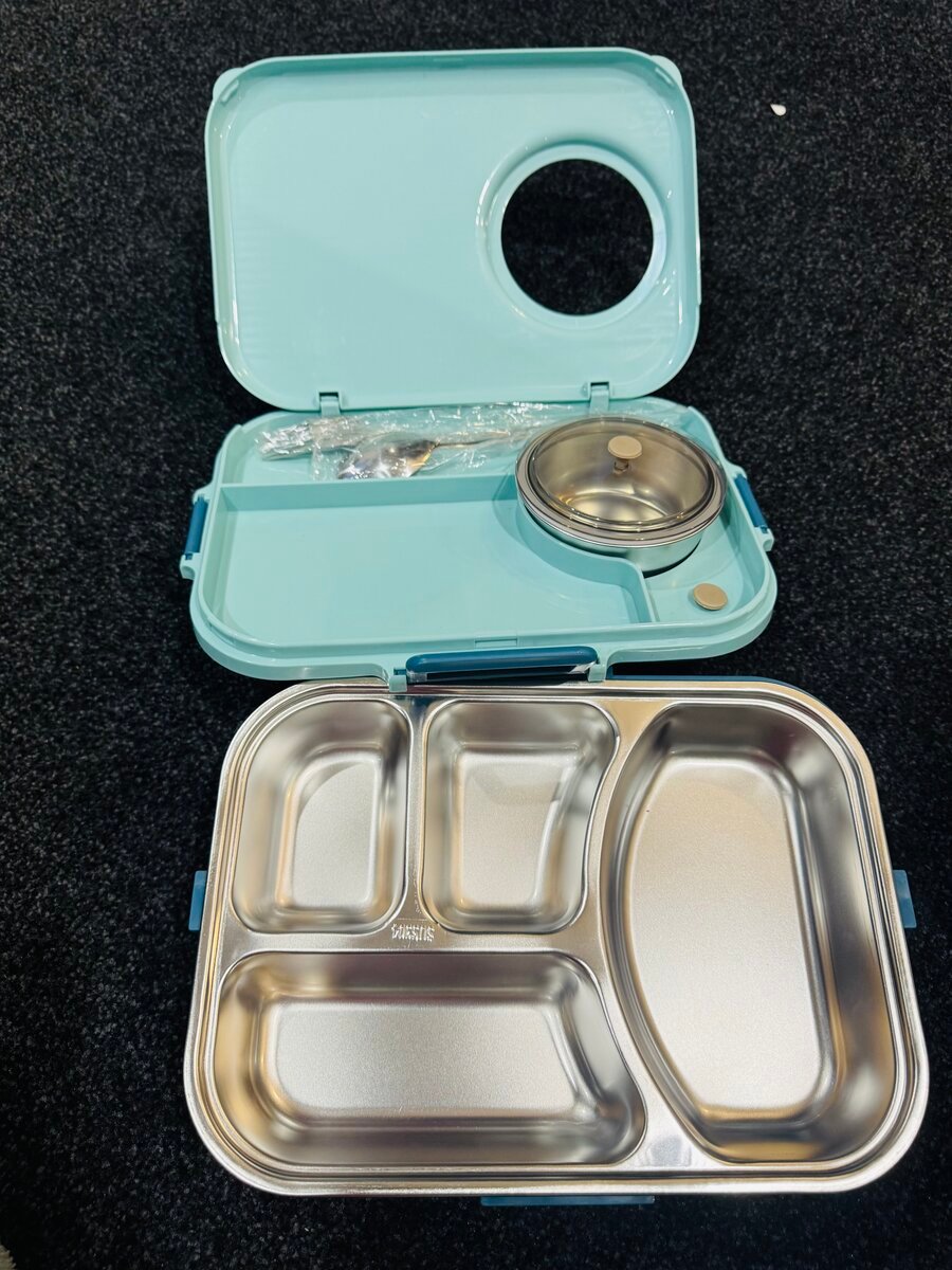 Top-rated stainless steel bento lunch box with four compartments, a sealed soup container and spoon, perfect for kids’ school lunches or adult meal prep.