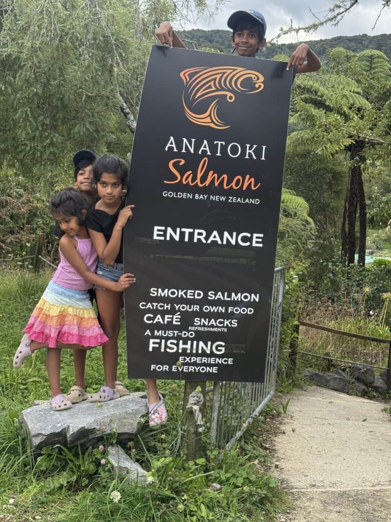 Kids at Anatoki Salmon entrance Golden Bay New Zealand family fishing experience